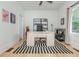 Bright office with hardwood floors, a large desk, and open space, perfect for work or study at 176 Olympic Pl, Decatur, GA 30030