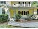Inviting front porch with classic columns and a well-maintained walkway leading to the entrance at 10035 Anaheim Dr, Alpharetta, GA 30022