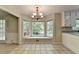 Bright breakfast nook with large windows and custom bench seating at 10035 Anaheim Dr, Alpharetta, GA 30022