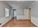 Spacious living room with hardwood floors and neutral color scheme at 10035 Anaheim Dr, Alpharetta, GA 30022
