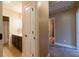 Hallway between the bathroom and additional living spaces at 12275 Styron Dr, Hampton, GA 30228