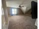 Spacious bedroom with neutral carpeting, ceiling fan, and natural light at 2295 Amberbrook Lane Ln, Grayson, GA 30017