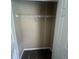 Empty walk-in closet with wire shelving and neutral carpet at 2295 Amberbrook Lane Ln, Grayson, GA 30017