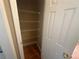 Storage closet with metal shelving and wood floors at 2295 Amberbrook Lane Ln, Grayson, GA 30017