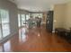 Dining room with hardwood floors, chairs, and windows that allow for natural light at 2295 Amberbrook Lane Ln, Grayson, GA 30017