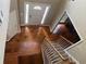 Inviting foyer with hardwood floors, a staircase, and a view to the front door at 2295 Amberbrook Lane Ln, Grayson, GA 30017