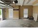 Spacious garage with open overhead door and natural light at 2295 Amberbrook Lane Ln, Grayson, GA 30017