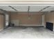 Spacious two-car garage with ample storage space and a clean concrete floor at 2295 Amberbrook Lane Ln, Grayson, GA 30017