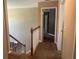Upstairs hallway with doorways leading to bedrooms and other spaces at 2295 Amberbrook Lane Ln, Grayson, GA 30017