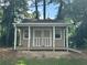 Outdoor shed structure with front door and ramp access at 2295 Amberbrook Lane Ln, Grayson, GA 30017