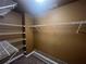 Walk-in closet offers ample storage space with metal shelving at 2295 Amberbrook Lane Ln, Grayson, GA 30017