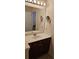 Bathroom with a single sink vanity, tile floors, and a large mirror at 3150 Woodwalk Se Dr # 3112, Atlanta, GA 30339