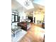 A spacious clubhouse with a seating area, kitchenette, and staircase at 3150 Woodwalk Se Dr # 3112, Atlanta, GA 30339