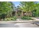 Clubhouse features a covered porch and landscaped front yard at 3150 Woodwalk Se Dr # 3112, Atlanta, GA 30339