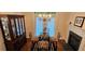 Comfortable dining area next to a fireplace and lit by a chandelier at 3150 Woodwalk Se Dr # 3112, Atlanta, GA 30339