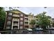 Residential brick apartment building with multiple balconies and accessible parking at 3150 Woodwalk Se Dr # 3112, Atlanta, GA 30339