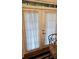 French doors with white curtains at 3150 Woodwalk Se Dr # 3112, Atlanta, GA 30339