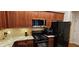Well-equipped kitchen featuring stainless steel appliances and granite countertops at 3150 Woodwalk Se Dr # 3112, Atlanta, GA 30339