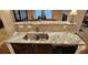 Kitchen with stainless steel sink and granite countertop at 3150 Woodwalk Se Dr # 3112, Atlanta, GA 30339