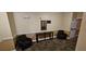 Comfortable lobby area with armchairs, a console table, and a decorative mirror at 3150 Woodwalk Se Dr # 3112, Atlanta, GA 30339