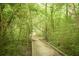 Scenic nature trail featuring a wooden path surrounded by lush greenery and natural landscapes at 3150 Woodwalk Se Dr # 3112, Atlanta, GA 30339