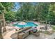 Beautiful community pool with outdoor kitchen, countertop, and seating at 3150 Woodwalk Se Dr # 3112, Atlanta, GA 30339