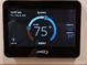 Smart thermostat display showing an inside temperature of 75 degrees at 3150 Woodwalk Se Dr # 3112, Atlanta, GA 30339
