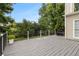 Large backyard deck featuring black metal railings and plenty of room for entertaining or relaxing at 505 Stedford Lane, Duluth, GA 30097