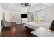 Spacious bedroom features tray ceiling, ensuite bathroom, large windows, plush carpeting and two beds at 505 Stedford Lane, Duluth, GA 30097