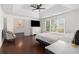 Serene bedroom with tray ceilings, two beds, and access to a luxurious ensuite bathroom at 505 Stedford Lane, Duluth, GA 30097