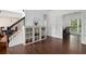 Hallway features hardwood floors and a built in china cabinet at 505 Stedford Lane, Duluth, GA 30097