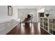 Elegant living room with hardwood floors, grand piano, and lots of natural light at 505 Stedford Lane, Duluth, GA 30097