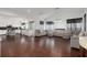 Spacious open concept living room features hardwood floors, modern lighting and seamless access to the kitchen at 505 Stedford Lane, Duluth, GA 30097