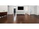 Spacious living room with gleaming floors, ample natural light, and an elegant layout for entertaining at 505 Stedford Lane, Duluth, GA 30097