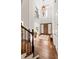 Grand foyer with high ceilings, hardwood floors, and a chandelier at 5140 Long Island Nw Dr, Sandy Springs, GA 30327