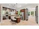 Open-concept kitchen with a large island, stainless steel appliances, and dark wood cabinets at 5140 Long Island Nw Dr, Sandy Springs, GA 30327