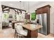 Kitchen with stainless steel appliances, granite countertops, and an island with seating at 5140 Long Island Nw Dr, Sandy Springs, GA 30327