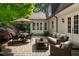 Outdoor patio featuring comfortable seating, lush landscaping, and a relaxing atmosphere at 5140 Long Island Nw Dr, Sandy Springs, GA 30327