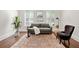 Cozy sitting room with hardwood floors, comfortable seating, and plenty of natural light at 5140 Long Island Nw Dr, Sandy Springs, GA 30327