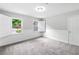 Well-lit bedroom with large windows with shutters and plush carpeting at 10300 Carleigh Ln, Roswell, GA 30076