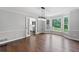 Bright dining area with bay windows and crown molding at 10300 Carleigh Ln, Roswell, GA 30076