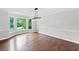 Charming dining room featuring a large window with a golf view at 10300 Carleigh Ln, Roswell, GA 30076