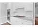 Modern kitchen with stainless steel appliances and granite countertops at 10300 Carleigh Ln, Roswell, GA 30076