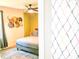 Relaxing bedroom featuring a ceiling fan, stylish woven wall decor, and comfortable bed at 2190 Gordon Se Cir, Smyrna, GA 30080