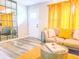 Living room featuring stylish couch and decor, hardwood floors, and modern mirror at 2190 Gordon Se Cir, Smyrna, GA 30080
