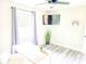 Well-lit office featuring large window, ceiling fan, TV and desk with bright sunlight at 2190 Gordon Se Cir, Smyrna, GA 30080