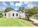 The backyard features a well-manicured lawn and mature trees, as well as the house at 2767 Kathie Ln, Ellenwood, GA 30294