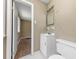 Bathroom featuring a vanity, mirror, and toilet at 2767 Kathie Ln, Ellenwood, GA 30294
