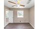 Bedroom with new flooring, natural light, and a ceiling fan at 2767 Kathie Ln, Ellenwood, GA 30294
