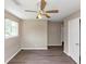 Bedroom with new flooring, a window, and a ceiling fan at 2767 Kathie Ln, Ellenwood, GA 30294
